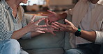 Angry, hands and couple with fight on sofa for toxic marriage, cheating blame and frustrated with betrayal. Affair, people and disagreement in home for infidelity, shouting or unhappy in relationship