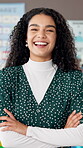 Arms crossed, face and smile of woman teacher in classroom of school for child development or scholarship. Education, knowledge and study with happy educator at academy for future, growth or teaching