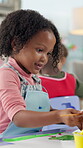 Talking, children and girl painting for art at school for learning, creativity and color picture. Education, happy or kid with activity for development with paint and paper for kindergarten artwork