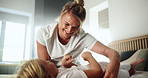 Home, mother and child with tickle for playing, laughing and bonding together in loving relationship. Bedroom, mom and girl with funny game for connection, childhood activity and support with trust