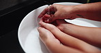 Home, parent and kid with hands for cleaning, healthcare or wellness with protection from virus. Closeup, mother or child with water for washing germs, bacteria or hygiene in bathroom sink from above