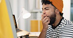 Tired, man and yawning with computer in office for exhaustion, burnout and article deadline. Male journalist, fatigue and bored with online for research, reading story and overworked for publication