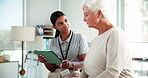 Discussion, senior woman and physiotherapist with tablet, rehabilitation and tracking process with web. Hospital, talking and tech elderly patient in medical appointment, healthcare and wellness