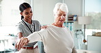 Physiotherapy, recovery or shoulder pain with consultant and patient in office for adjustment or treatment. Healthcare, joint injury and rehabilitation with people in clinic for medical assessment