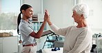 High five, rehabilitation or tablet with doctor and patient in office for motivation or success. Healthcare, medical or physiotherapy with old woman and therapist in clinic for celebration or goals