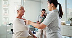 Medical appointment, physiotherapist and senior woman in clinic, rehabilitation or tracking process with tablet. Hospital, healthcare and women with treatment for elderly patient, helping or wellness