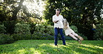 Father, girl and play with spin in backyard, holding hands and happy for bonding with love in summer. People, dad and child with flight, game and connection for care in family garden on lawn in Spain