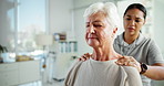 Senior woman, physiotherapist and shoulder massage with pain for injury, posture or recovery at clinic. Elderly, female person or chiropractor with checkup or feeling for muscle tension at hospital