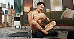 Drinking water, laptop and fitness with man at home for online class, workout streaming and wellness. Health, sweating and virtual gym subscription with person on floor of living room for exercise