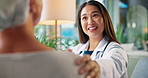 Healthcare, doctor and old woman with consultation, talking and laughing with recovery. Senior patient, medical advice and professional in office, good news or appointment with checkup for treatment