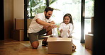 Packing, box and kid with father for real estate loan, property relocation and smile. Child, girl and dad moving to new home with package for mortgage, belongings or helping together in dream house