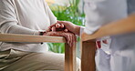 Doctor, senior person and holding hands for comfort of bad news, compassion and medical diagnosis. People, empathy and console patient for healthcare, wellness problem and helping of treatment advice