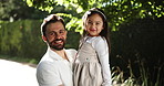Dad, child and smile outdoor on face in garden with family, growth and happiness. Portrait, female kid and man in nature for holiday with father and daughter for love, care and bonding together