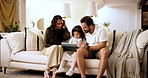 Sofa, mother and father with girl for tablet, learning and education game for cognitive development. Home, mom and dad with child for digital entertainment, streaming service and bonding together