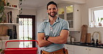 Happy man, plumber and kitchen with confidence for water damage, piping renovation or home leak. Portrait, male person or repairman with smile or arms crossed for professional house fix or call out