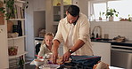 Family, child or dad packing lunch box in home with sandwich, phone call or bag for school. Remote work, father or girl kid with bread for food, snack or meal for nutrition, multitasking and care