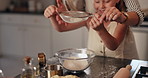 Home, utensils and mother with girl, baking and bonding together with ingredients, help and recipe. Parent, family and mama with daughter, growth and learning with support, kid and cooking in kitchen