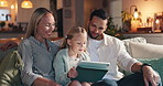 Tablet, relax and parents with child in home for playing educational game together with bonding. Happy, love and family with online learning on app with digital technology in living room at house.
