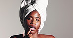 Woman, face and sugar scrub on lips for beauty treatment, shine or organic exfoliation. Skincare, mouth or happy model apply facial cosmetics for glow, peeling and sequence on white studio background