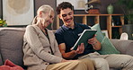 Tablet, healthcare and nurse with senior woman in nursing home for medical consultation. Digital technology, discussion and male caregiver with elderly patient for explaining treatment plan in house.