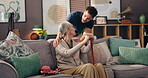 Home, caregiver and senior woman with walking stick for mobility, support and communication on sofa. House, physiotherapist and female person with disability for rehabilitation, talking and cane
