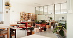 Pottery, ceramic and interior of empty workshop with clay objects, design and collection on table. Creative, art studio and shelves with cups, bowls and sculpture for diy craft, hobby and decoration