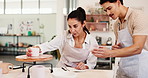 Student, instructor and pottery with cup for check, artwork or creativity with ceramic hobby in workshop. Man, woman and notes in art class, inspection or assessment with learning handmade craft