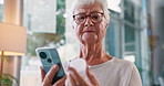 Elderly woman, phone and reading with medication for research, symptoms or side effects at home. Senior, female person or patient with mobile smartphone or pharmaceuticals for prescription or dosage