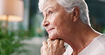 Thinking, regret and elderly woman with stress in living room of retirement home with dementia. Anxiety, worried and lonely senior female person with alzheimer, sad memory nostalgia and depression