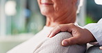 Doctor, senior woman and support with comfort for recovery, compassion and medical diagnosis. People, empathy and holding hands with patient for healthcare, helping and console for treatment advice