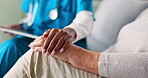 Caregiver, senior woman and holding hands for comfort of bad news, compassion and medical diagnosis. People, tablet and console patient with healthcare report, recovery progress and treatment support