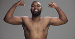 Studio, black man and face with flexing for arms, kissing muscle and confidence for fitness progress. Happiness, male person and bodybuilder with bicep in portrait, workout results or gray background