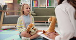 Psychology, talking or toys with woman and girl for playing games, learning development or story. Classroom, wellness therapy or fairy tale with child, kid student or psychologist with stuffed animal