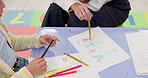 Teacher, hands or child with drawing for assessment, fine motor skills or lesson at home. Closeup, educator or private tutor with kid or elementary student with art sketch for childhood development
