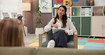 Doctor, child and talk therapy with psychology evaluation, behavior assessment or discussion in office. Psychotherapy, girl patient or psychologist with paperwork for CBT, autism diagnosis or support