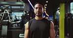 Bodybuilder, fitness and man in gym, training and challenge with endurance, energy and workout. Asian person, athlete and exercise in wellness center, warm up and breathing with routine and health