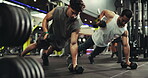 Fitness, bodybuilding and men with weights, gym and exercise for wellness or muscle with equipment. Health club, athlete and personal trainer with power for body, routine or bodybuilder with strength