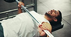 Fitness, barbell and man in gym, wellness and challenge with training, endurance and strong. Person, athlete and equipment in health center, power and bodybuilder with energy and weightlifting