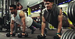 Routine, bodybuilding and men with weights, gym and exercise for wellness or muscle with equipment. Health club, athlete and personal trainer with power for body, fitness or bodybuilder with strength