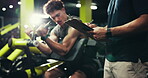 Power, trainer and man with machine, gym and exercise for wellness, clipboard and writing progress. Health club, instructor and person with fitness for body, routine and bodybuilder with strength