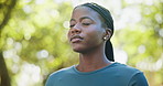 Meditation, wellness and woman with breathing by park for mindfulness, healing aura or spiritual mental health. Zen, girl and peaceful in nature with fresh air, face or eyes closed for energy balance