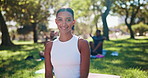 Yoga, morning and face of woman in park for exercise, workout and training outdoor. Nature, pilates and portrait of happy person resting, calm and relax for wellness, health or zen energy on grass