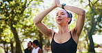 Yoga, woman and praying hands with meditation in nature for mindfulness, healing aura and spiritual mental health. Zen, girl yogi and peaceful at park with breathing, eyes closed and energy balance