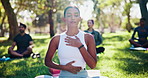 Outdoor, breathing and woman in park for meditation with calm, peace or health exercise. Wellness, balance and female person with warm up, zen or chakra activity for yoga class in nature in field.