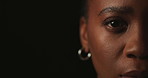 African woman, face and eyes in studio with mock up space for optometry test by black background. Person, portrait and vision assessment for eyesight test, cornea and contact lenses in Nigeria