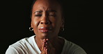 Scared, worry and prayer with black woman on dark background for fear, nervous and confused expression. Stress, anxiety and isolated female person with phobia, emotions and crisis reaction in studio