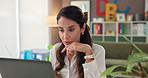 Laptop, teacher thinking and woman in office for planning course, problem solving or idea for curriculum. Computer, educator or person online with reflection, grading or reading paper in kindergarten