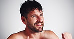 Clean, man and happy with wet hair in studio for shampoo shine, morning routine and grooming. Hygiene, person and smile for self care with scalp cleansing treatment and results on white background