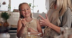 Mother, daughter and playful baking in kitchen with fun together, bonding and love for learning cooking at home. Woman, girl child and happy to prepare baked goods with flour on nose for playing