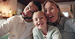 Happy family, silly faces and home with selfie at night for photography, picture or memory together. Portrait, mom and dad with playful or goofy child for capture moment or funny expressions at house